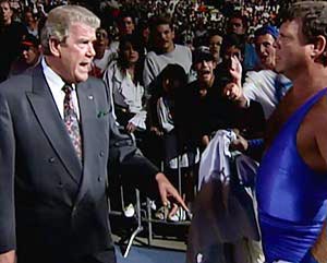 At SummerSlam 93, WWF President Jack Tunney orders Jerry Lawler into the ring to fight Bret Hart. Lawler attempted to get out of the match by faking an injury. photo: wwe.com