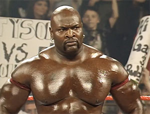 ahmed johnson suing wwe
