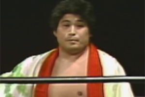 Wrestler Hiro Matsuda in white and red ring robe